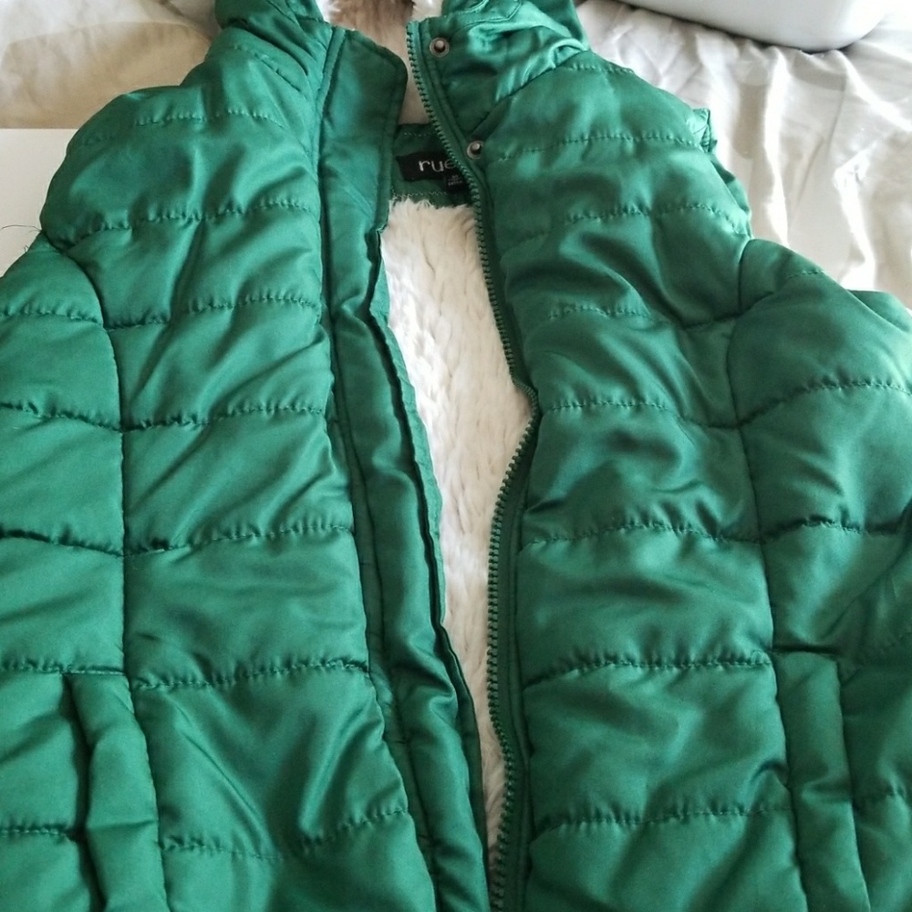 Quilted vest with sherpa lining.
